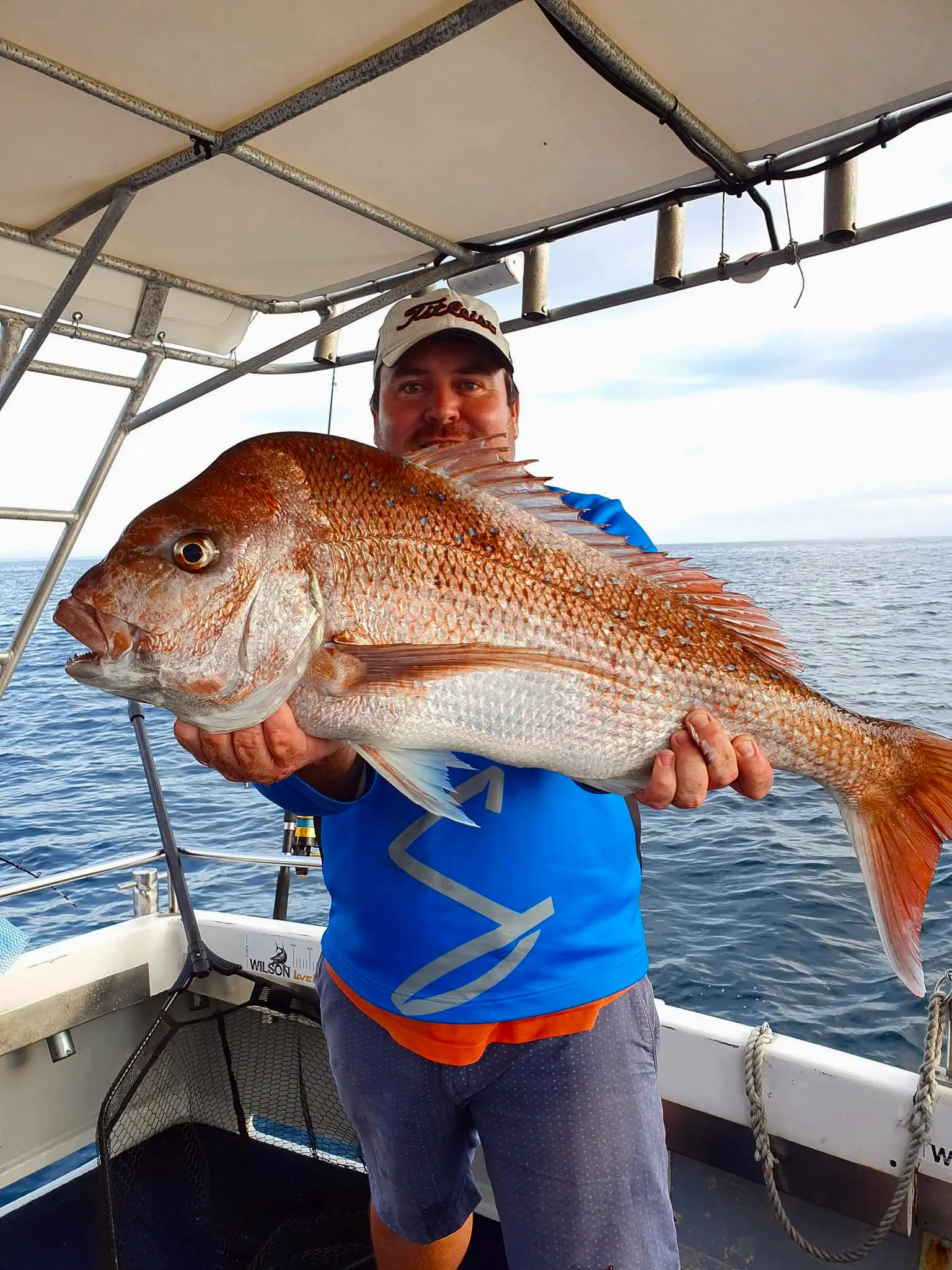 Comfortable seating and covered cabin onboard MV SeaQuest Gold Coast fishing charter