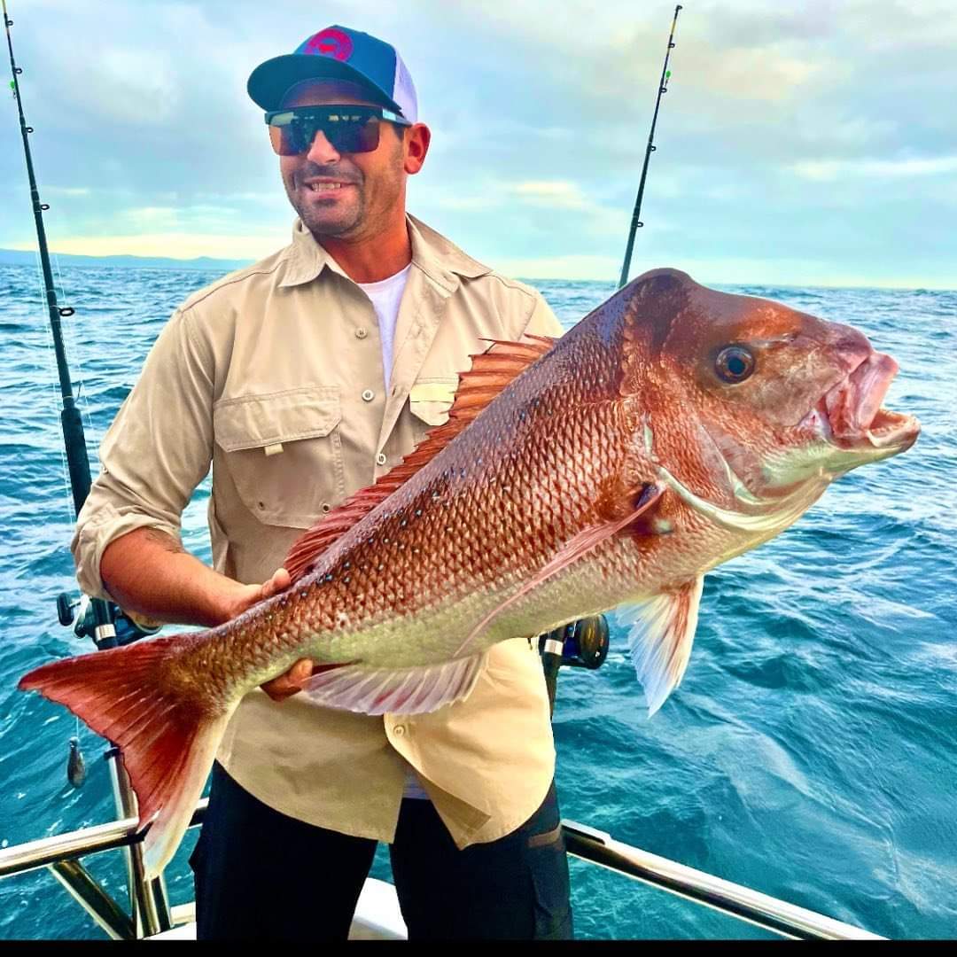 Catching snapper off the Gold coast on a fishing charter